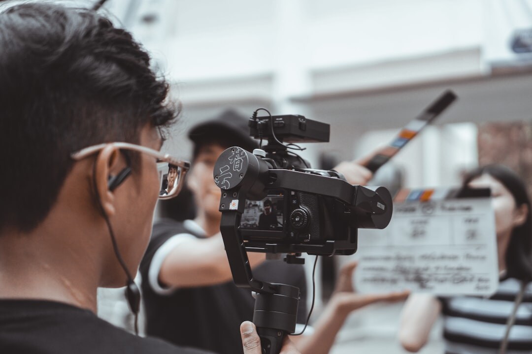 director on film set with camera