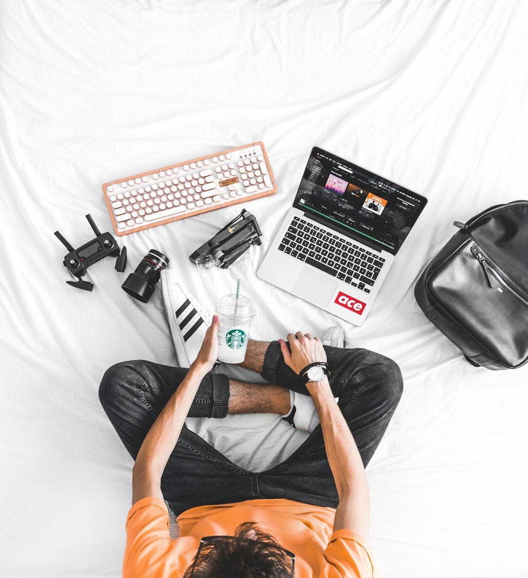 Swiss documentary filmmaker reviewing footage on a laptop